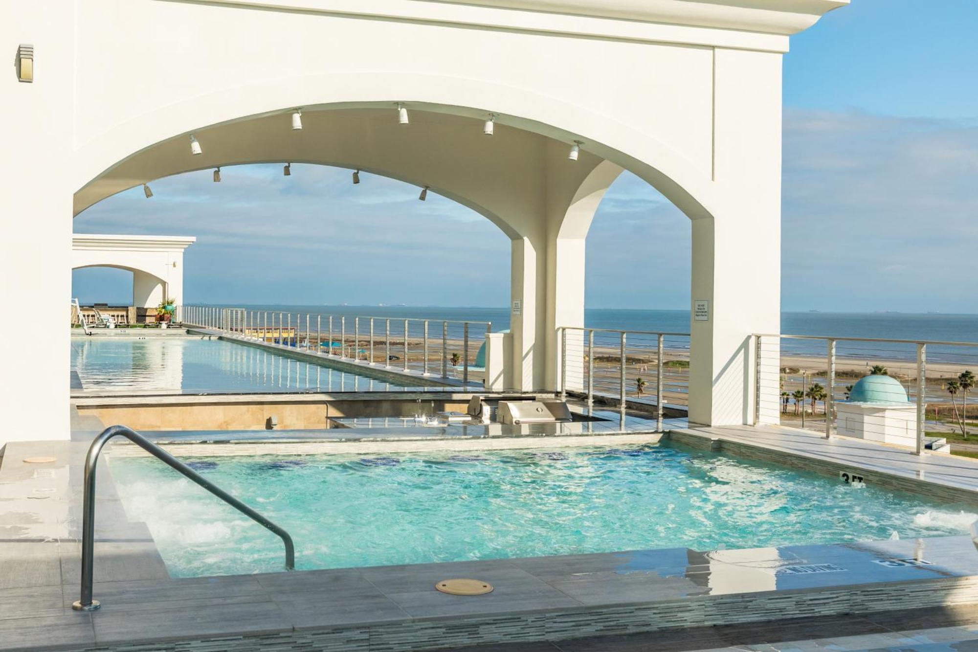 Emerald By The Sea Retreat Галвестон Номер фото